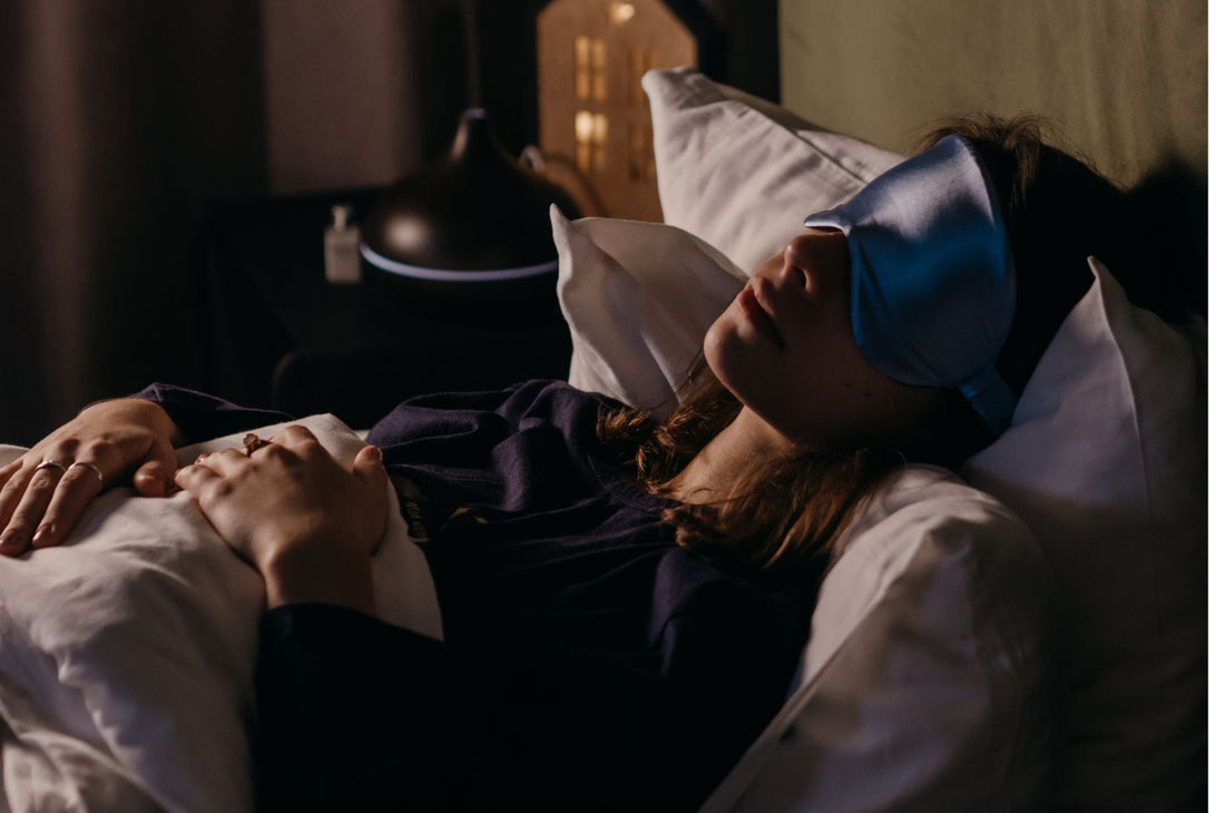 Woman sleeping peacefully in bed