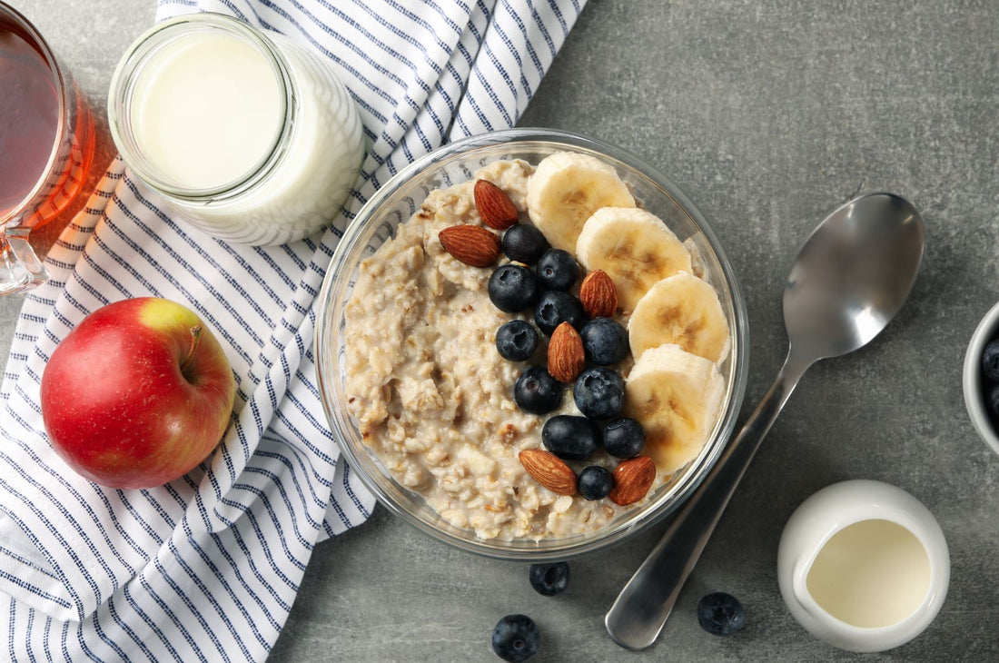 Oatmeal with Fruits and Milk on Gray Background