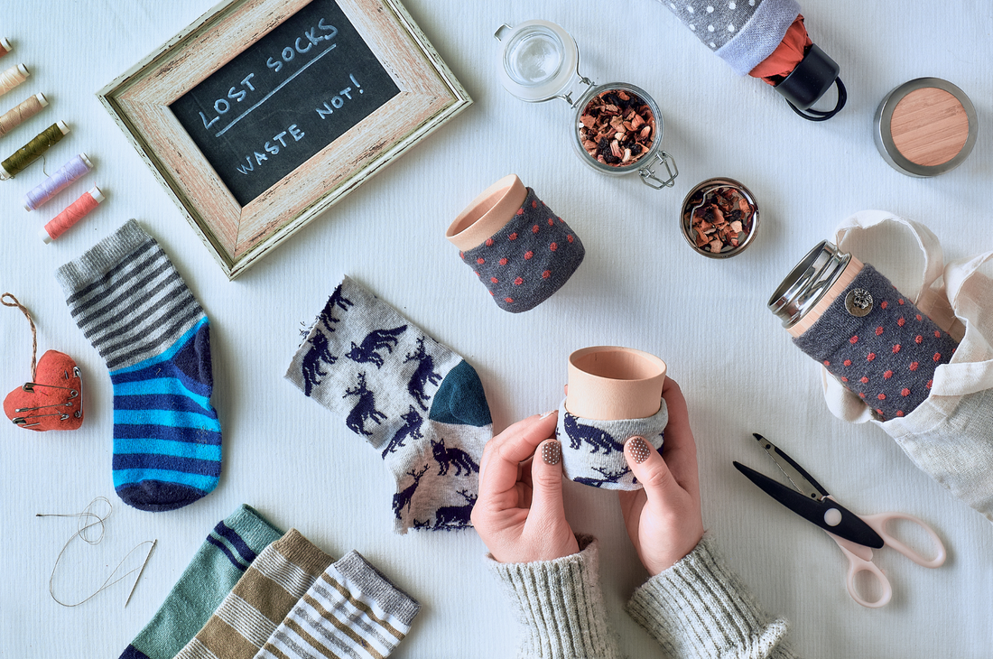 Upcycle & DIY crafts for a hygge lifestyle - woman wrapping a sock around a jar