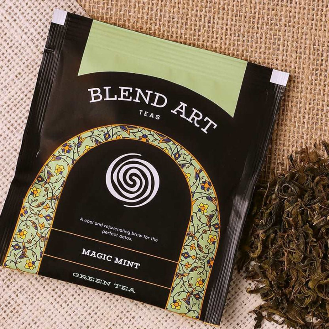 Individually wrapped Blend Art Magic Mint tea sachet – whole-leaf green tea in a pyramid sachet for optimal flavor and freshness.