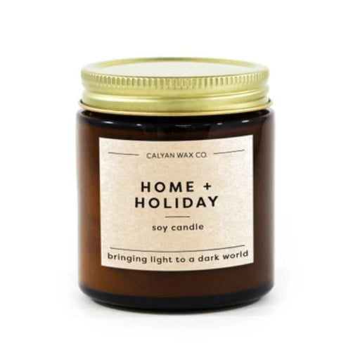 Candle jar with a label on a white background