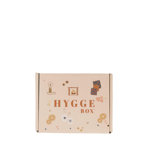 Box labeled 'Hygge Box' with decorative elements on a white background