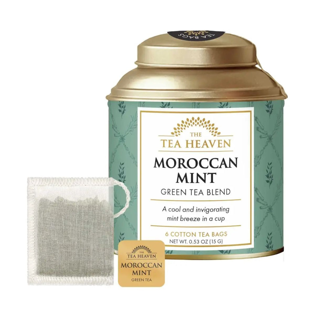 Tea canister with Moroccan Mint green tea blend and a tea bag on a white background