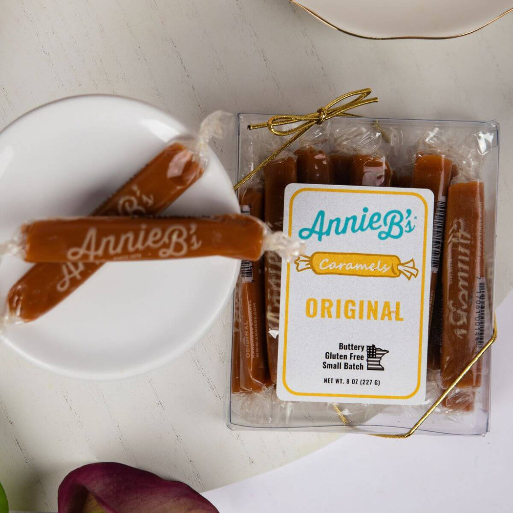 Packaged caramels with 'Annie B's' label on a white surface