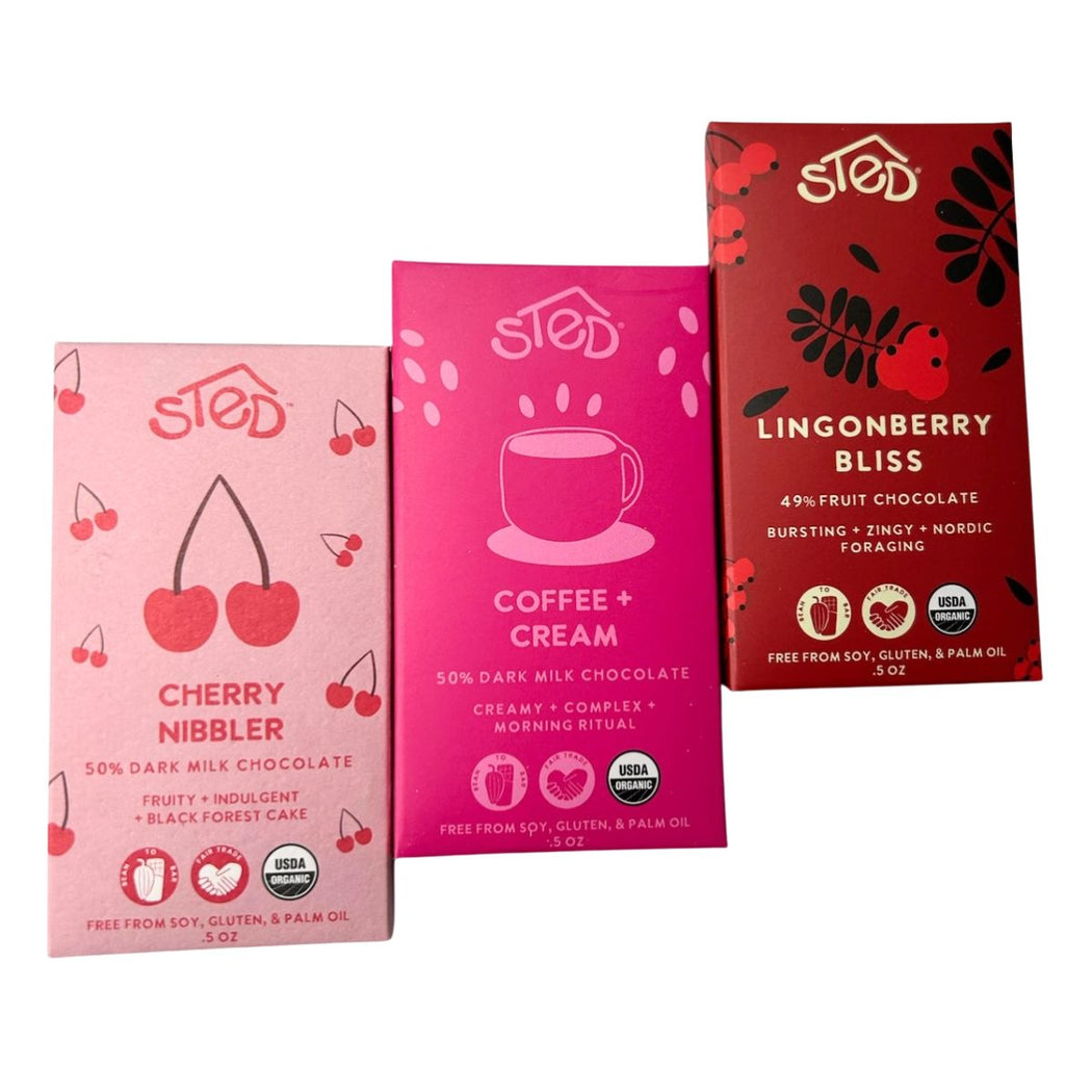 Three Sted chocolate bars in different flavors on a white background