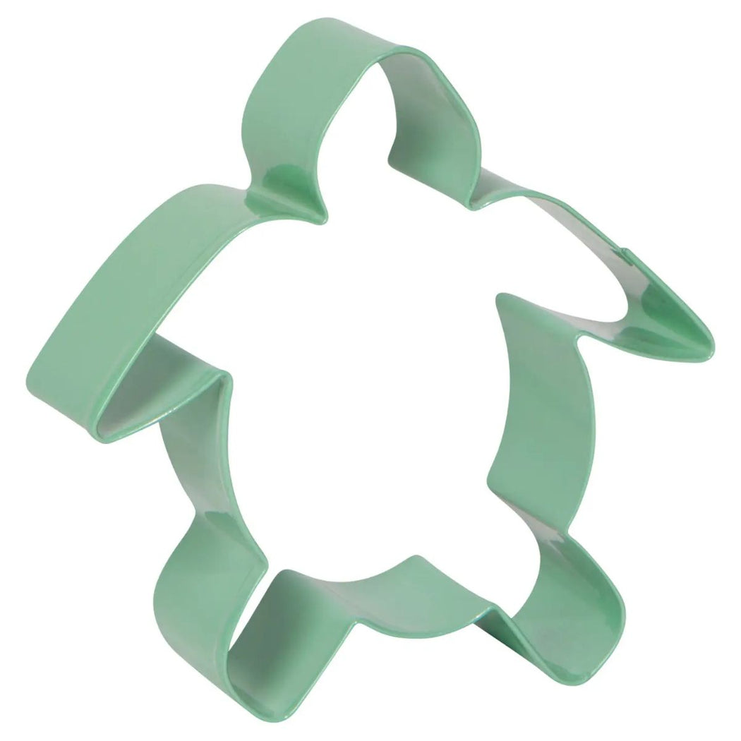 Sage green fish-shaped cookie cutter on a white background