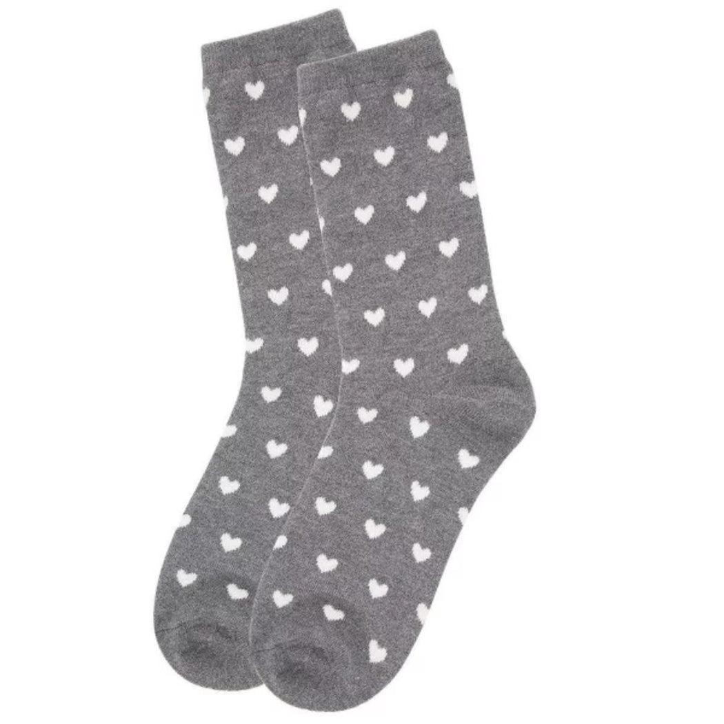 Gray socks with white heart patterns on a white background