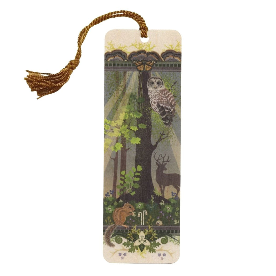 A rectangular wooden bookmark with a hanging tassel, featuring a woodland illustration of an owl, deer, squirrel, and trees on a cream background.